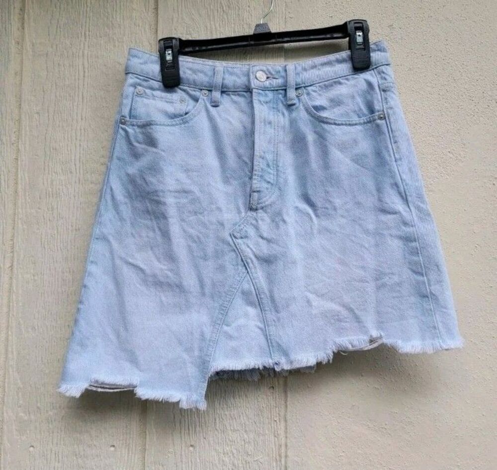 Free People We The Free going rogue denim Mini Skirt sz 27 asymetric raw hem